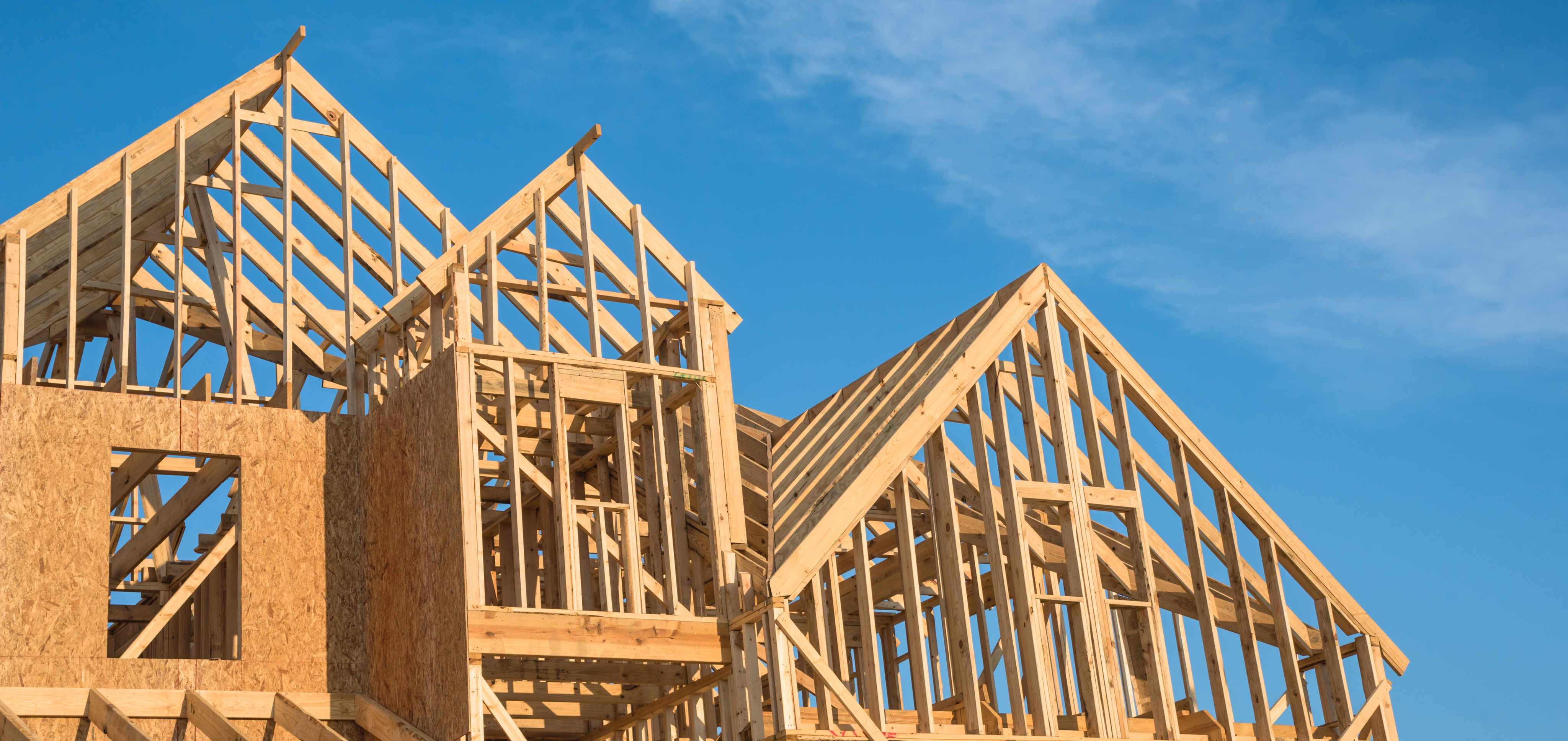 Contractors framing a new building
